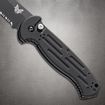 Close-up of black knife handle with textured grip