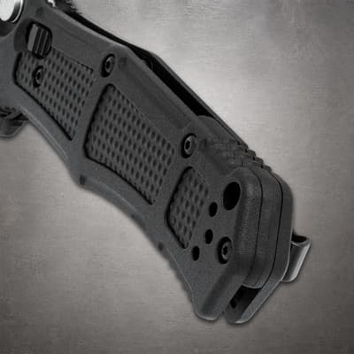 Close-up of black knife handle with textured grip