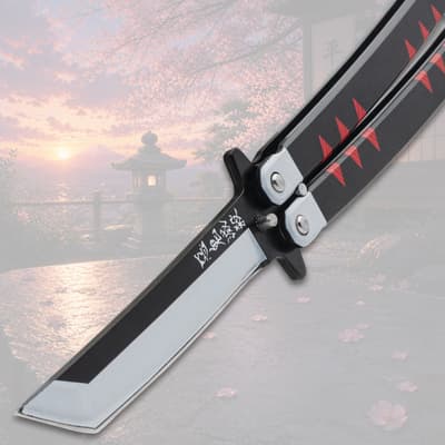 Close-up of butterfly knife blade with black handle, cherry blossom background