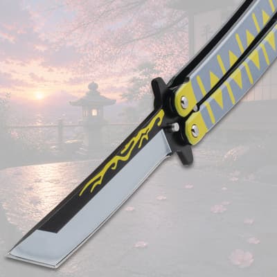 Close-up of butterfly knife blade with decorative design