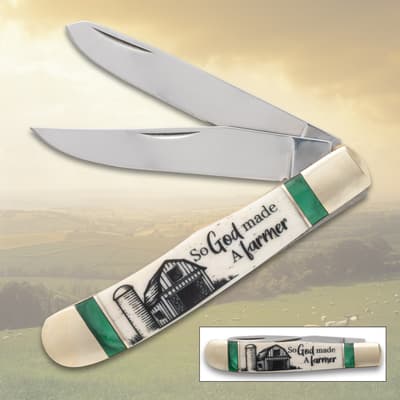 Pocket knife with 'So God made a farmer' design, open blades