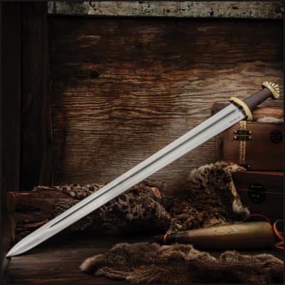Viking sword displayed on fur and wood with a rustic backdrop