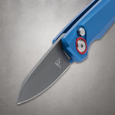 Close-up of blue knife with open blade