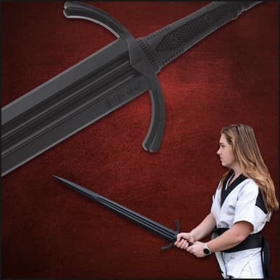 Person holding a black training sword, close-up of hilt