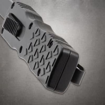 Close-up of black knife handle with textured grip
