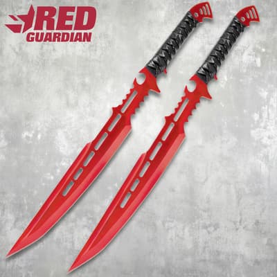 Two red fantasy swords with black handles on a textured background