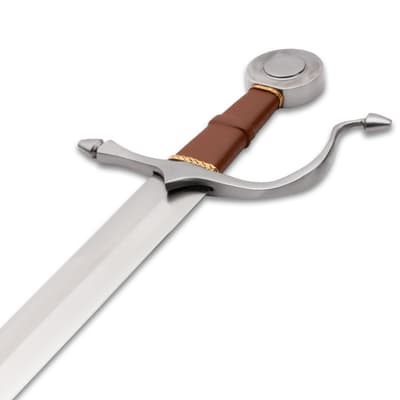 Close-up of sword hilt with brown leather grip
