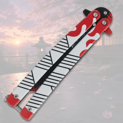 Closed butterfly knife with red and black flame design