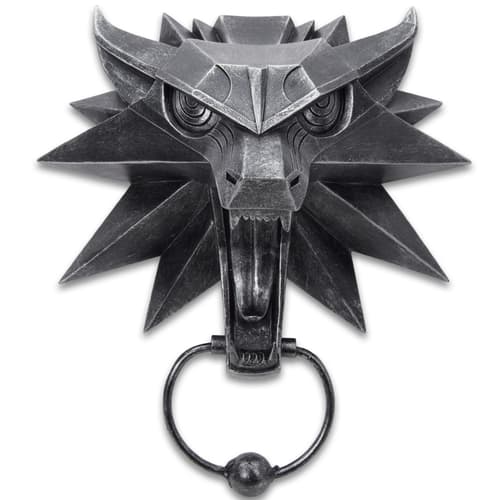 Meticulously cast in the shape of a wolf head, it has a high-quality resin construction with a metal door knocker