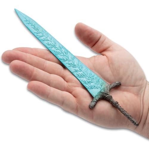 Sword laying on a hand.