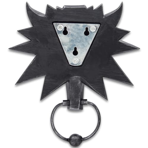 The door knocker is 7”X 8”X 4 1/2” and has nail/screw slots on the stainless steel hanging plate