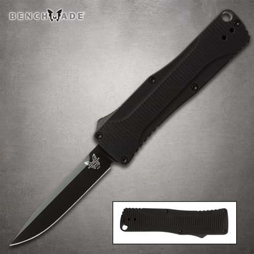 Black folding knife with textured handle and logo