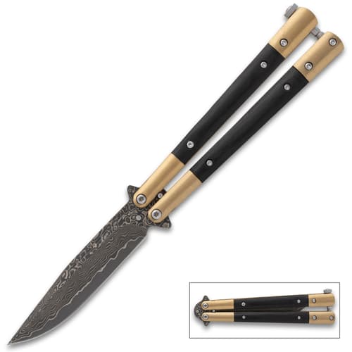 Butterfly knife with Damascus blade and gold accents, open position