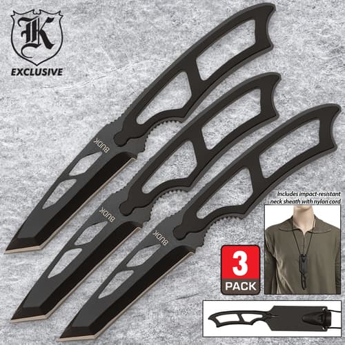 Three black knives with openwork handles on a textured surface