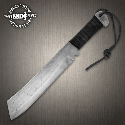 Large machete with a wrapped handle and engraved blade