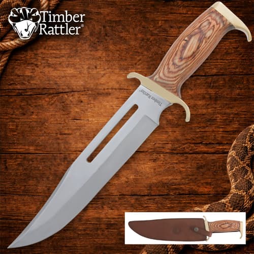 Bowie knife with wood handle on wooden background