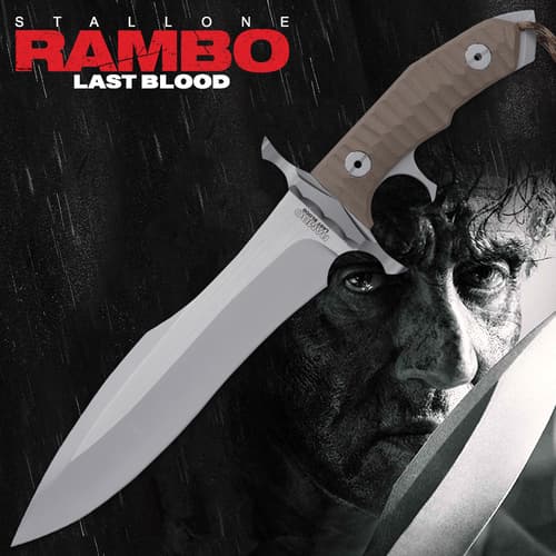 The Rambo Last Blood Heartstopper Knife prominent sleek blade and textured tan handle