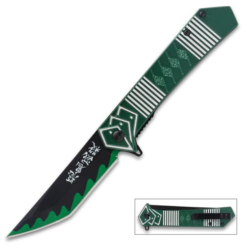 Green and black folding knife with geometric design