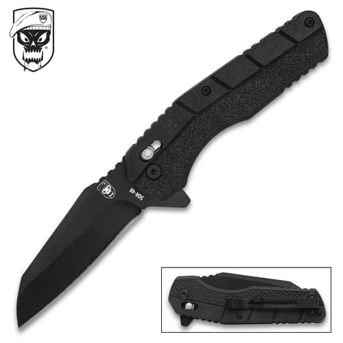 folding knife with textured handle and logo