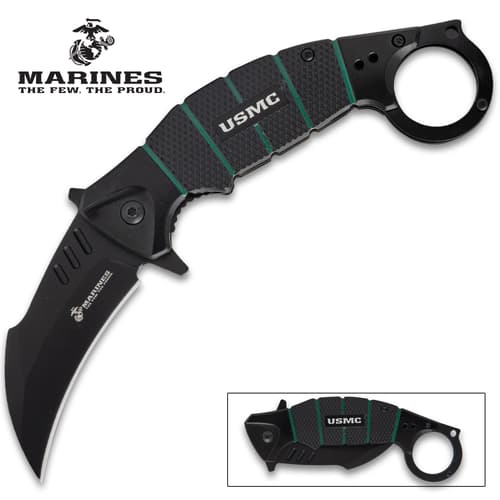 Black USMC karambit knife with curved blade and finger ring