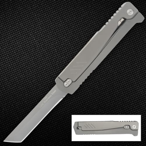 Stainless steel folding knife on textured background