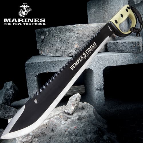 Black machete with 'Semper Fidelis' on concrete blocks