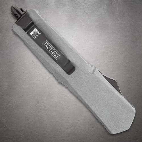 Closed tactical knife with USA branding on clip