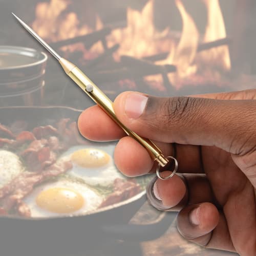 Gold Titanium Spring Toothpick in hand
