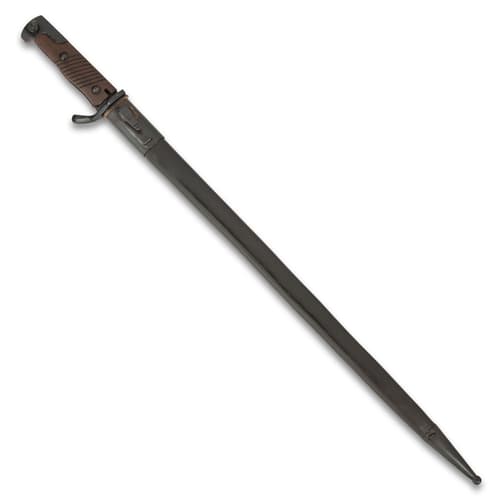 The 25 1/2” overall length bayonet slides securely into a genuine black leather scabbard with black metal fittings