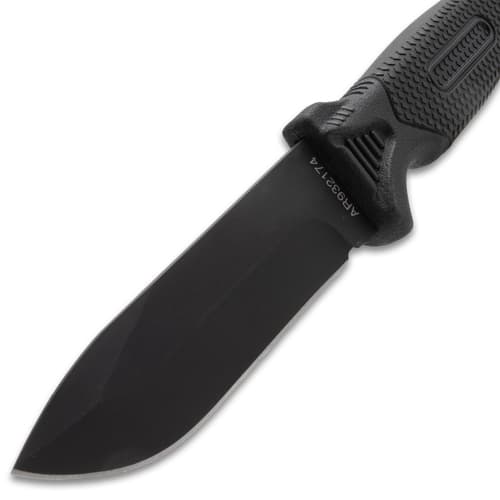 Close-up of black knife blade and handle