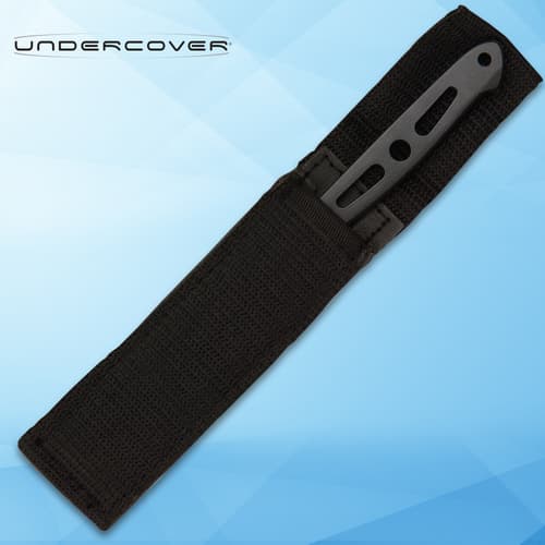 Knife in black sheath on blue background