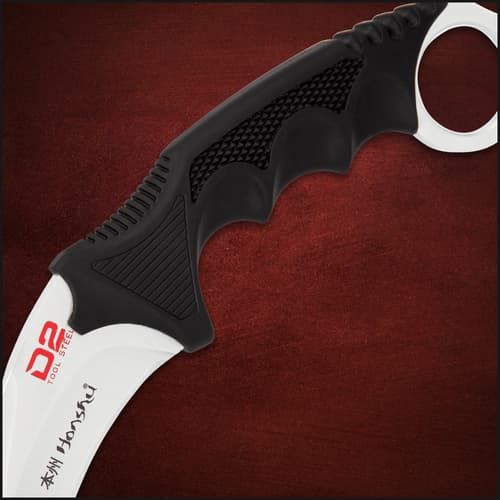 The karambit is 8 3/4" in overall length and it can be carried discreetly in a tough ABS, adjustable shoulder harness sheath