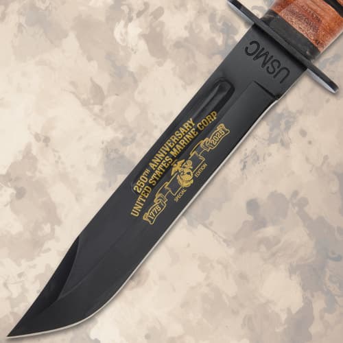 Close-up of USMC 250th anniversary knife blade inscription