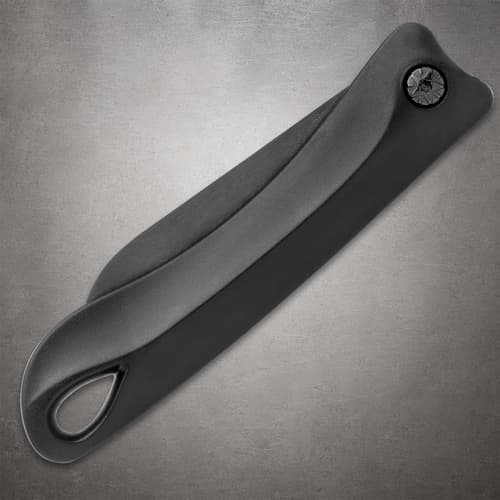 Closed black ceramic pocket knife showing its curved handle, pivot screw and teardrop-shaped pommel opening