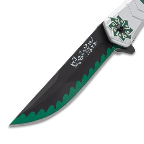 Close-up of knife blade with green edge and symbols