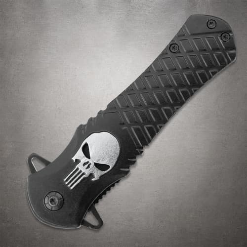 Closed view of Black Legion Silver Skull pocket knife featuring a textured black handle with a silver skull design