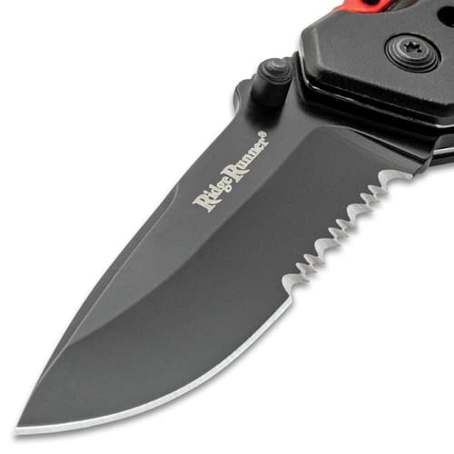 Ridge Runner Black and Red Fireman Knife blade close up