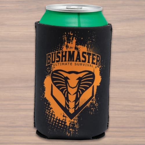 A can is shown inside a black koozie with an orange paint splatter effect on the Bushmaster logo, which features a snake head image.