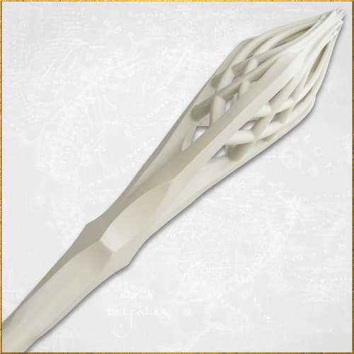 Close-up of the top part of a white staff with lattice design