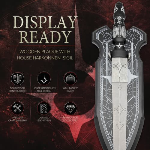 Close-up of a knife blade with engraved patterns