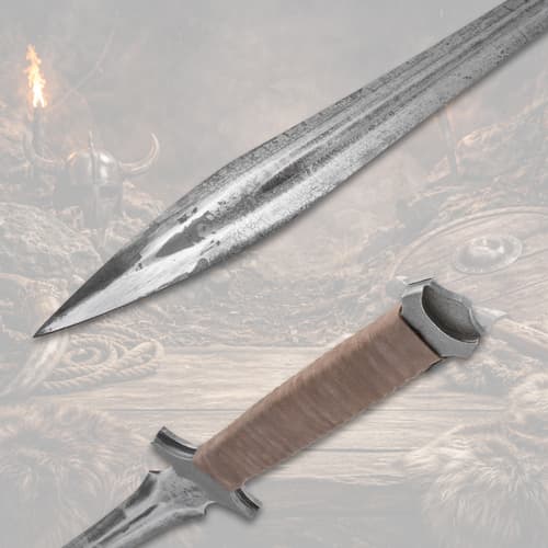 Close-up of sword blade and handle with leather grip