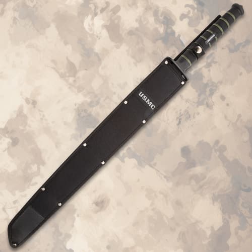 The sword comes with a nylon sheath with &ldquo;USMC&rdquo; embroidered on the front.