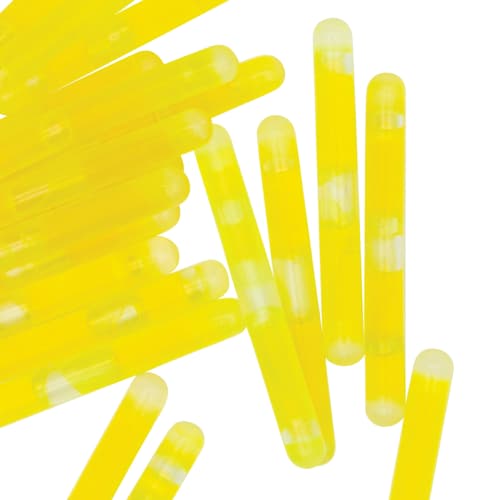 Close-up of yellow glow sticks on a white background