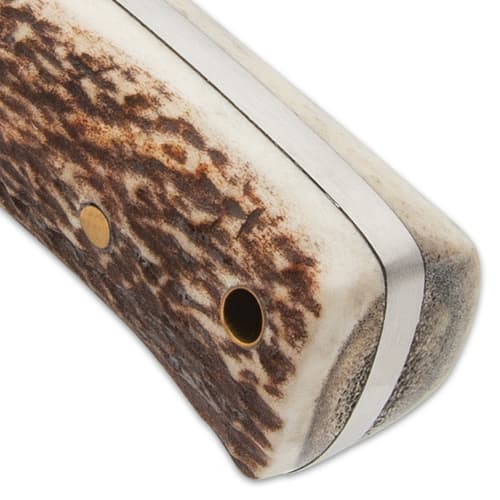 The genuine stag handle has brass handle pins, plus, a lanyard hole and the hand guard is solid, polished brass