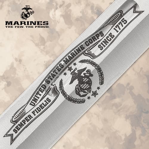 Close-up of USMC engraving on knife blade