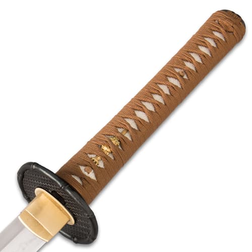 Magnified view of samurai sword handle with genuine rayskin wrapped with brown japanese cord attached to iron handguard