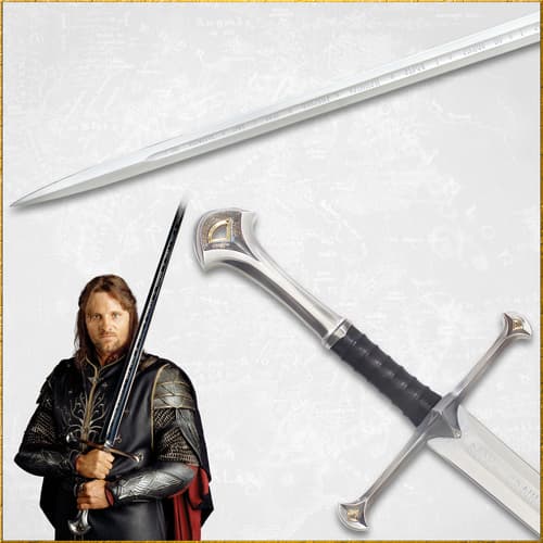 Close-up of a sword with a character holding it