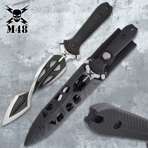 M48 Tsunami dagger with sheath on a textured surface