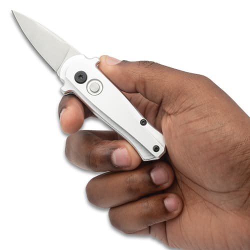 Silver Autmatic Knife held in hand
