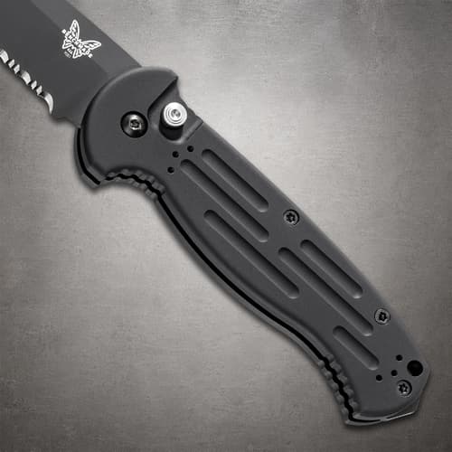 Close-up of black knife handle with textured grip